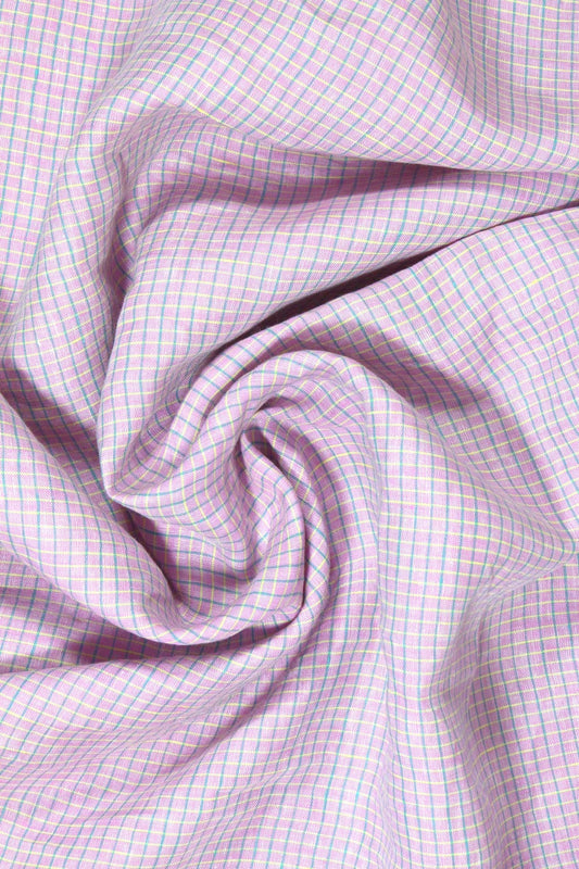 Close-up of checkered fabric with a lilac and lemon yellow grid pattern